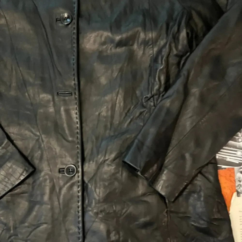 Black leather vintage couture jacket